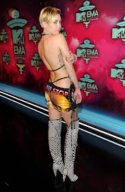 Miley Cyrus Backless and Braless Cleavage At MTV Europe Music Awards 2013 in Amsterdam Miley Cyrus Backless and Braless Cleavage At MTV Europe Music Awards 2013 in Amsterdam