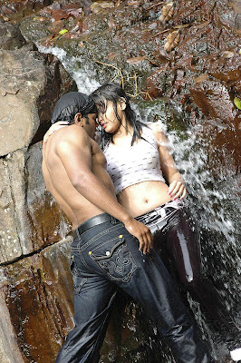 Indian actress Sneha Ullals wet pants get sticked to her body and expose hot thighs and sexy back