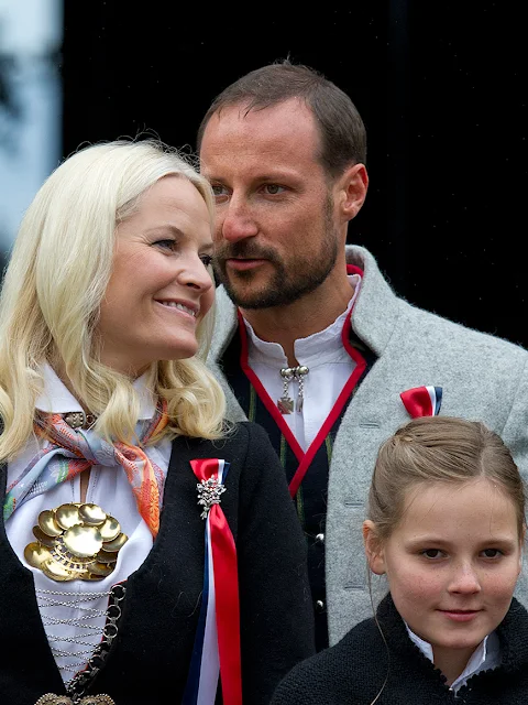 King Harald and Queen Sonja, Crown Prince Haakon of Norway and Crown Princess Mette-Marit of Norway with Princess Ingrid Alexandra, Prince Sverre Magnus and Marius Borg Høiby greet the Childrens Parade on the Skaugum Estate 