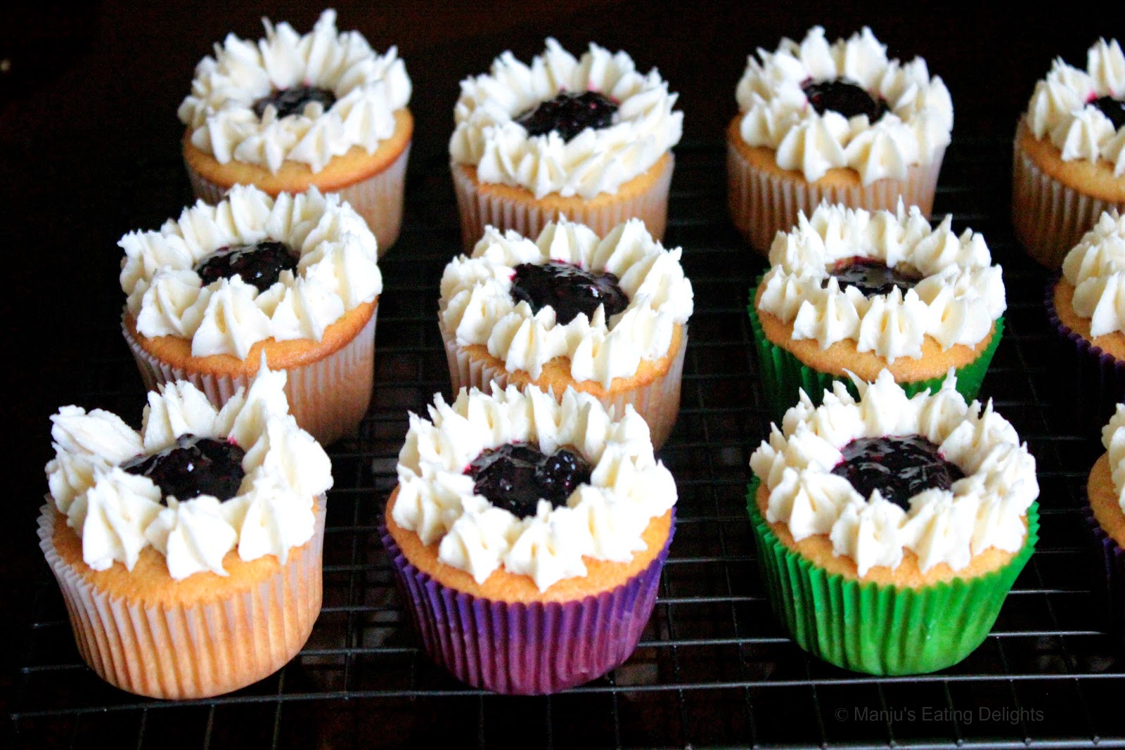 Manju's Eating Delights Vanilla Cupcakes with mixed Berry compote filling