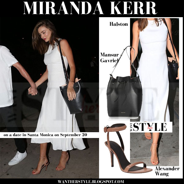 Miranda Kerr in white dress with black ...
