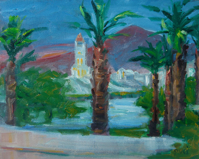 Scotty's Castle in Death Valley Desert depicted as a night scene in oils, with palm trees