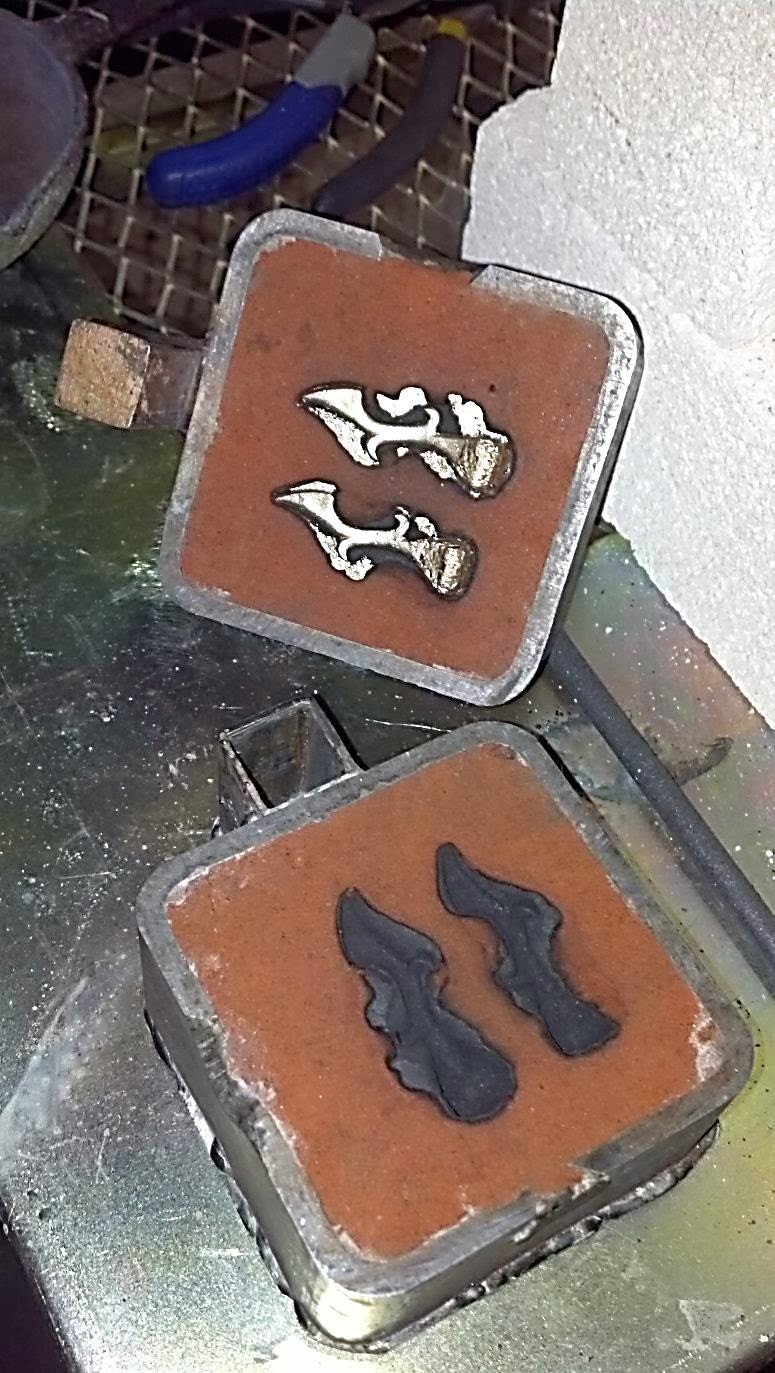Opened flask, note the flashing which will need to be removed.