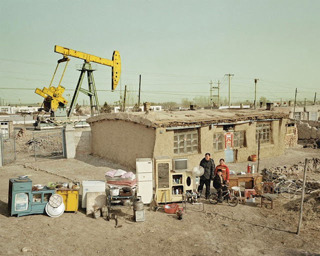 Familias chinas con todas sus cosas en una sola foto Por Huang Qingjun