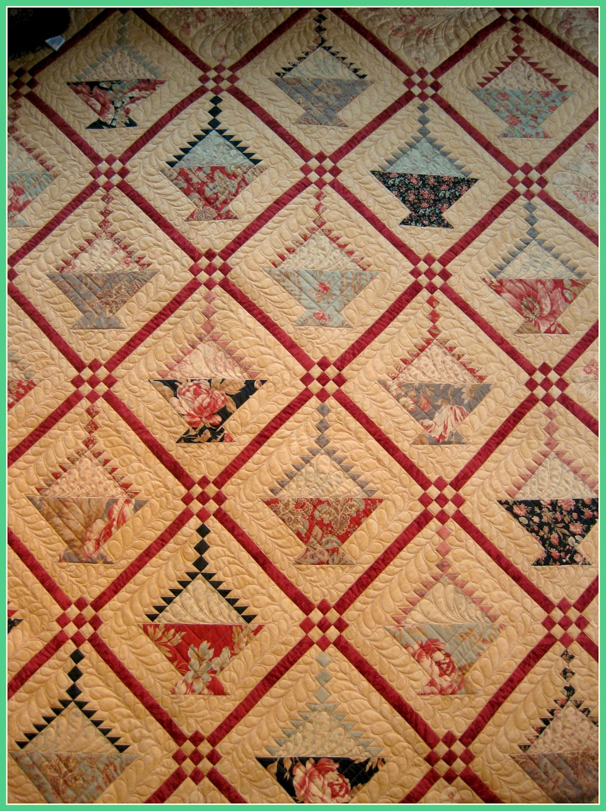 T. in the Burg Hanging Basket Quilt Still on a Roll
