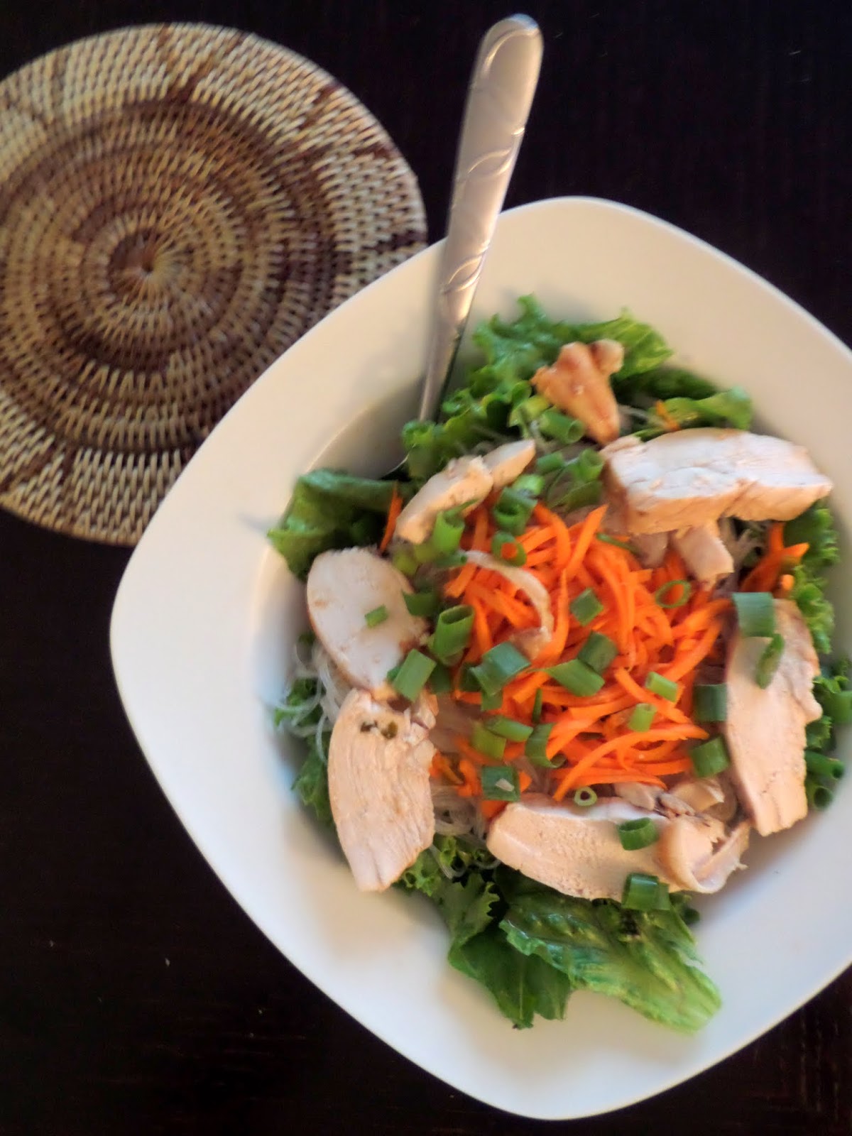 Lemongrass Chicken Vermicelli:  A fresh salad with herbs, vegetables, and rice noodles topped with juicy chicken flavored with lemongrass and other southeast Asian flavors.