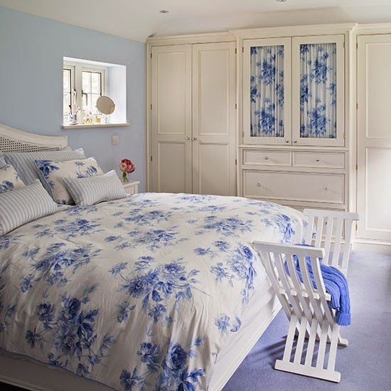 Bedroom blue floral design and fitted wardobe