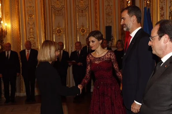 Queen Letizia of Spain and King Felipe VI of Spain attends for the State Dinner hosted by French President François Hollande at the Elysee Palace