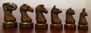 different Arimaa playing pieces