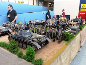 1/6 scale diorama of an army post on display at a scale model exhibition.