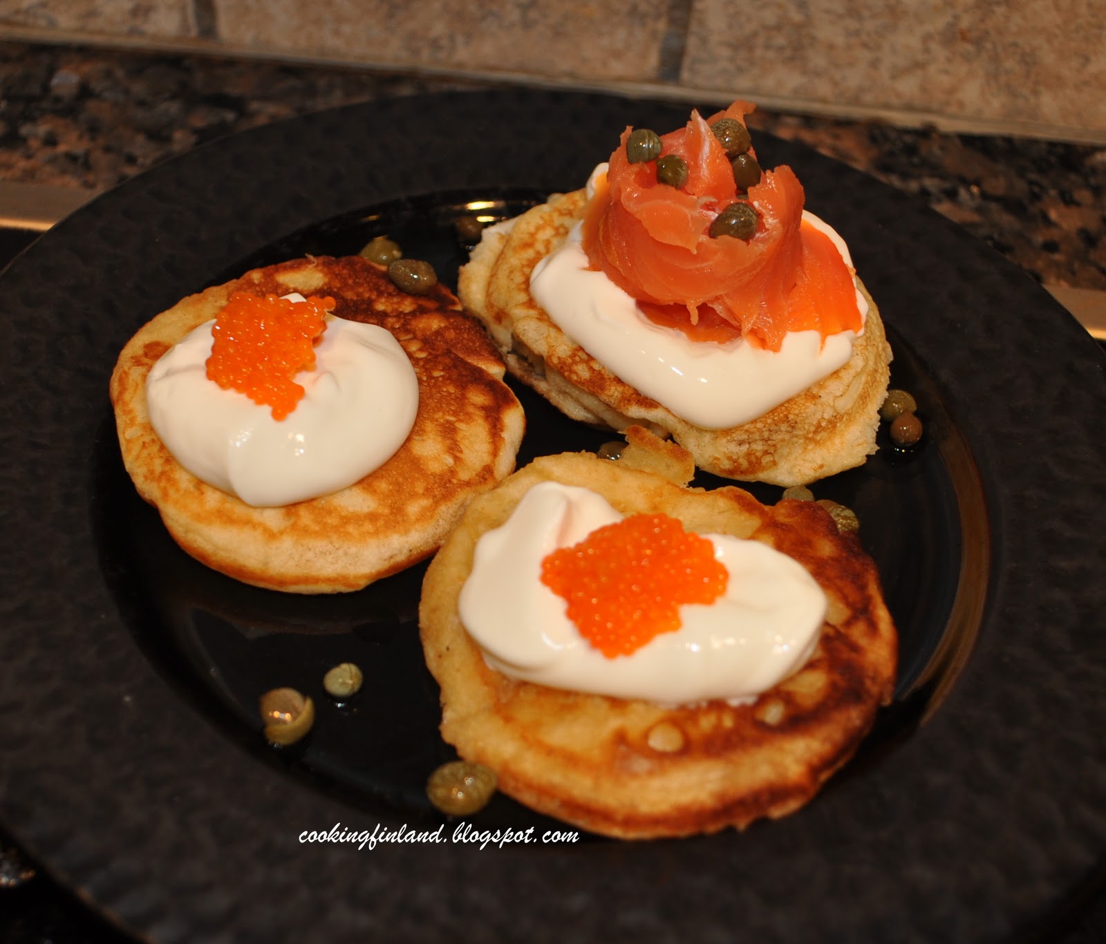 Cooking Finland Blinis with sour cream, caviar and smoked salmonblinit