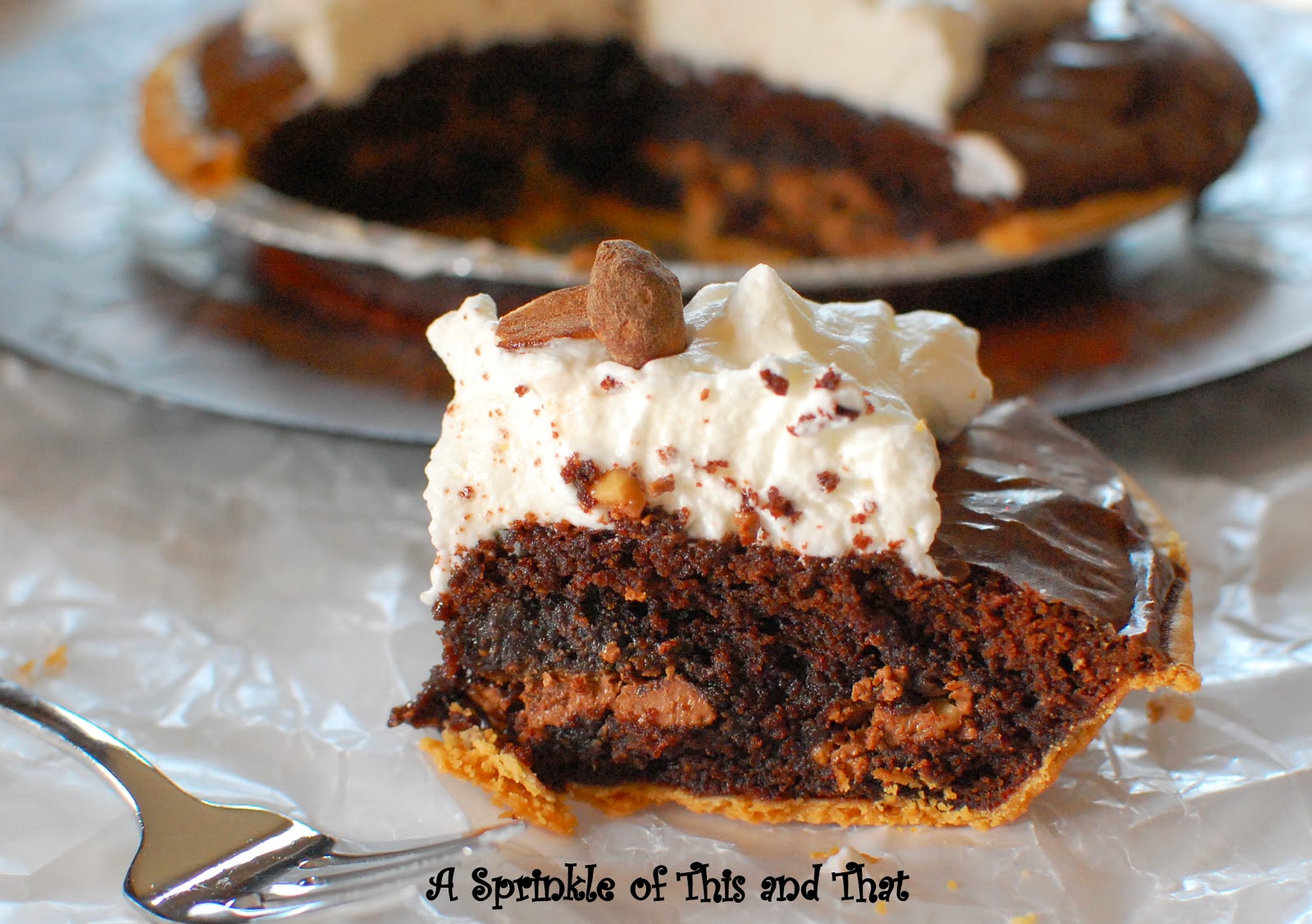 A Sprinkle of This and That Symphony Brownie Pie with Almond Whipped