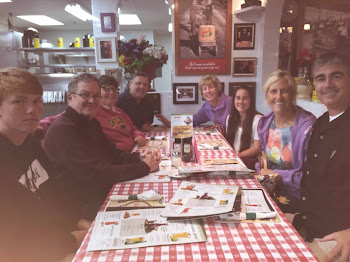 Eating in the kitchen at Buca's!