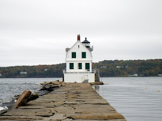 Walking on the 4,300 foot long breakwater to Breakwater Lighthouse in Rockwell, Maine