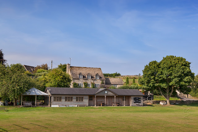 Swinbrook village cricket green in the Cotswolds by Martyn Ferry Photography