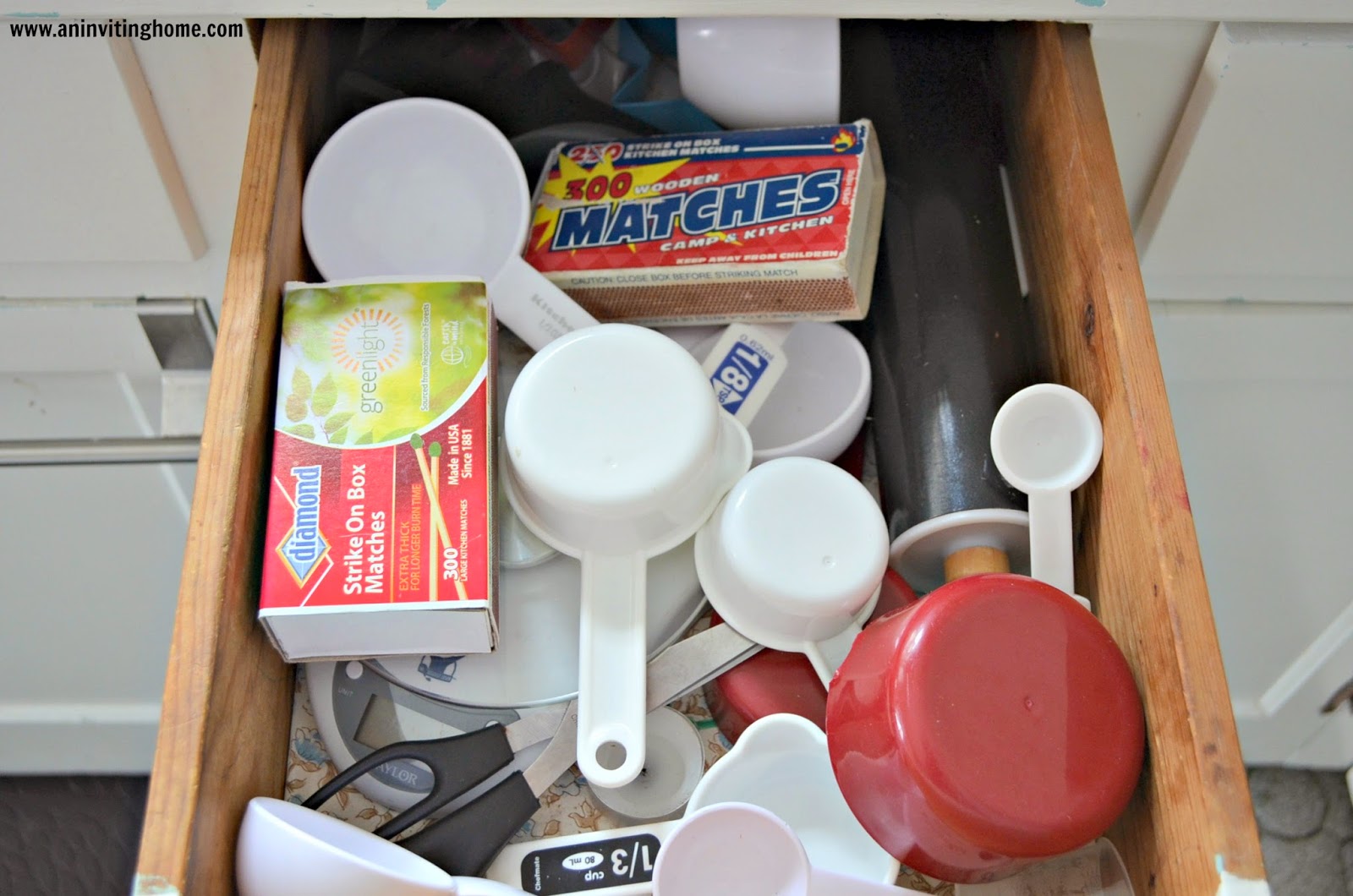 An Inviting Home Organizing Measuring Cups & Spoons