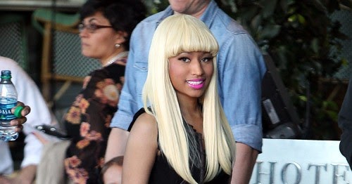 Nicki Minajs Swimsuit Transformation A Closer Look At Her Amazing Style Evolution - epvyrje