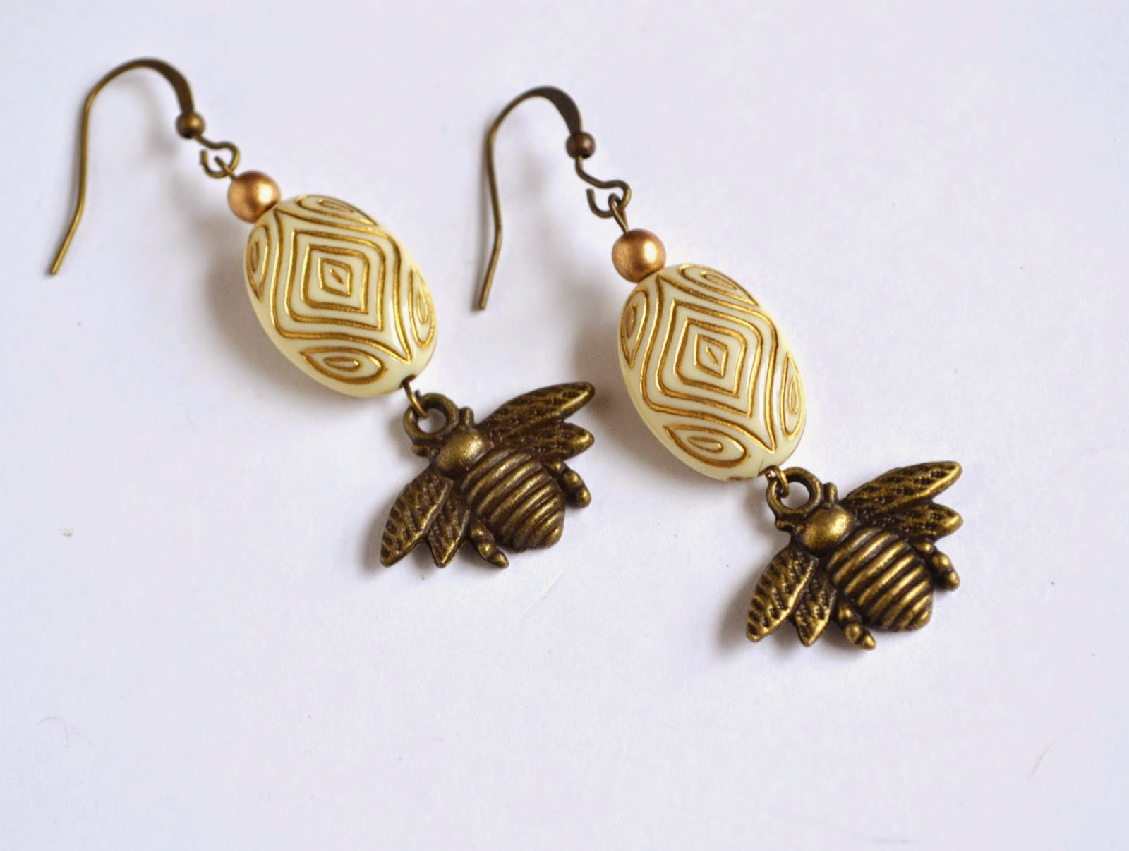 https://www.etsy.com/listing/75885541/bee-earrings-honey-bee-jewelry-bees?ref=shop_home_active_22