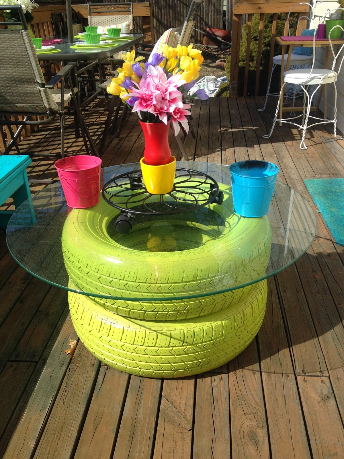 Colorful DIY outdoor deck seating benches makeover with tire table