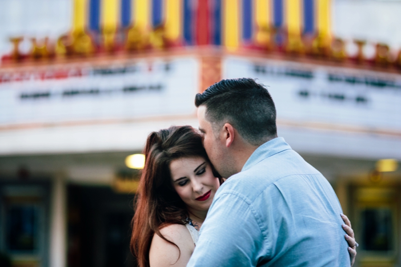 in front of the Plaza Theatre at sunrise for their Atlanta engagement session