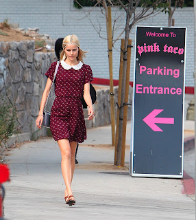 Isabel Lucas in a polga dor short dress leaving the restaurant