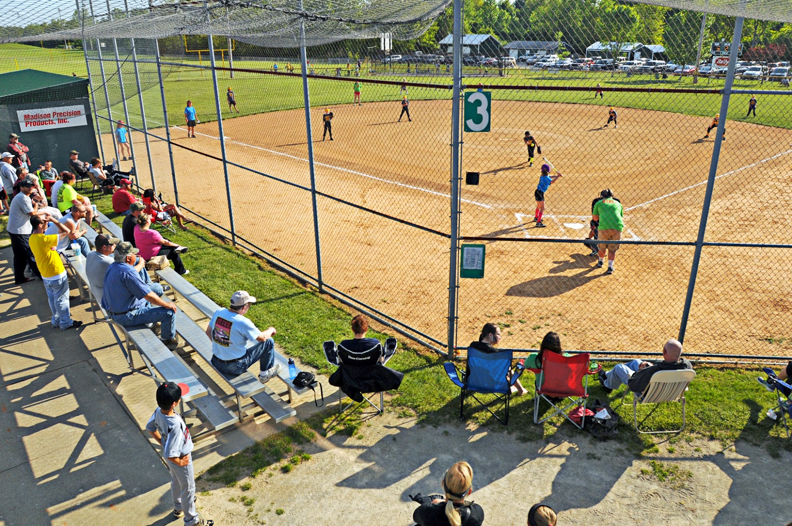 families and other spectators watch the action on the field at rucker s sports complex on opening day of the city s little league season on monday families and other spectators watch the action on the field at rucker s sports complex on opening day of the city s little league season on monday