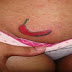 Art Tattoo feminina virilha pimentão