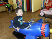 Watching Backyardigans in his Airplane chair (feb )