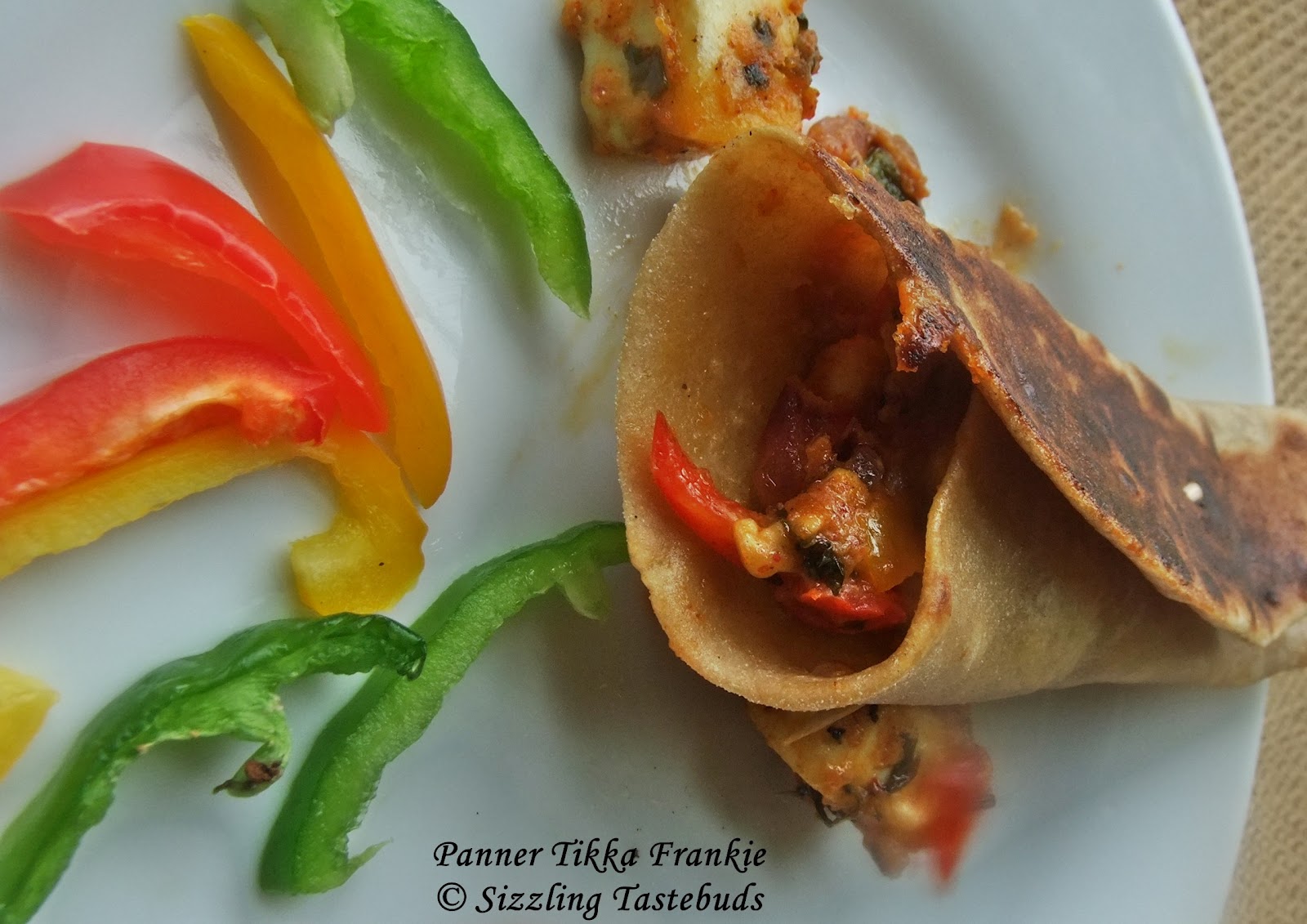 Sizzling Tastebuds Paneer Tikka Frankie Cottage cheese stuffing in
