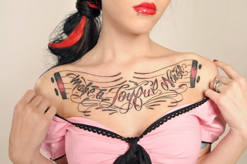 Woman Chest Tattoos 9