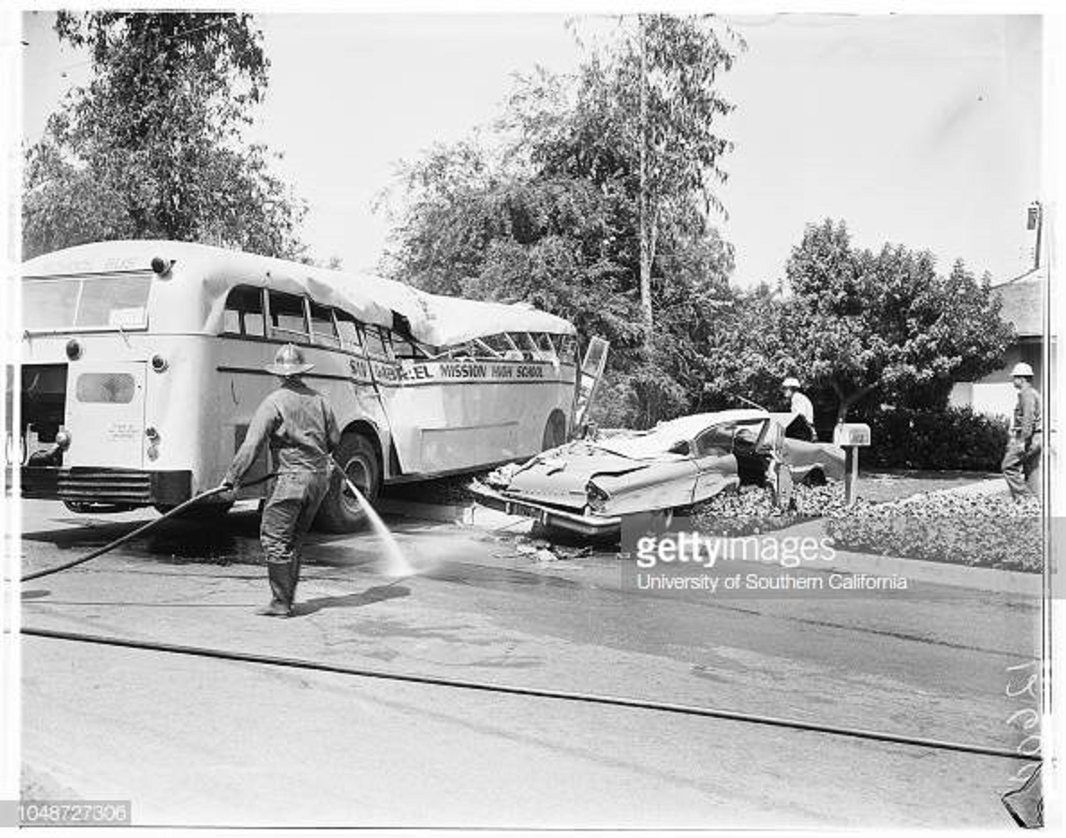 Bus flattens car