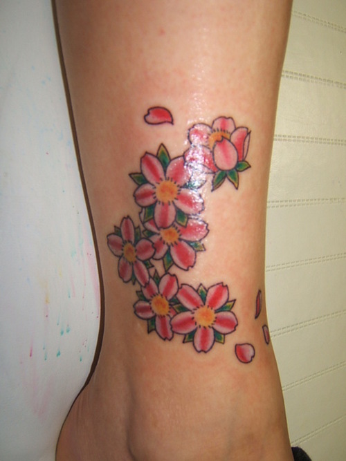 blossom tattoos. cherry lossom tattoos. at