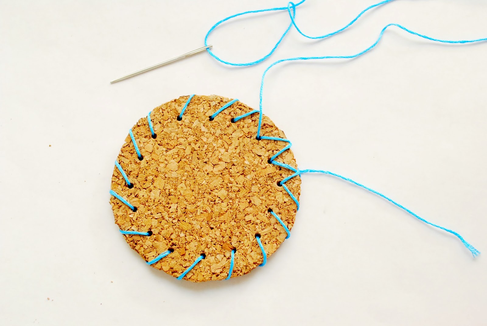 Once you go all the way around, start stitching in the opposite