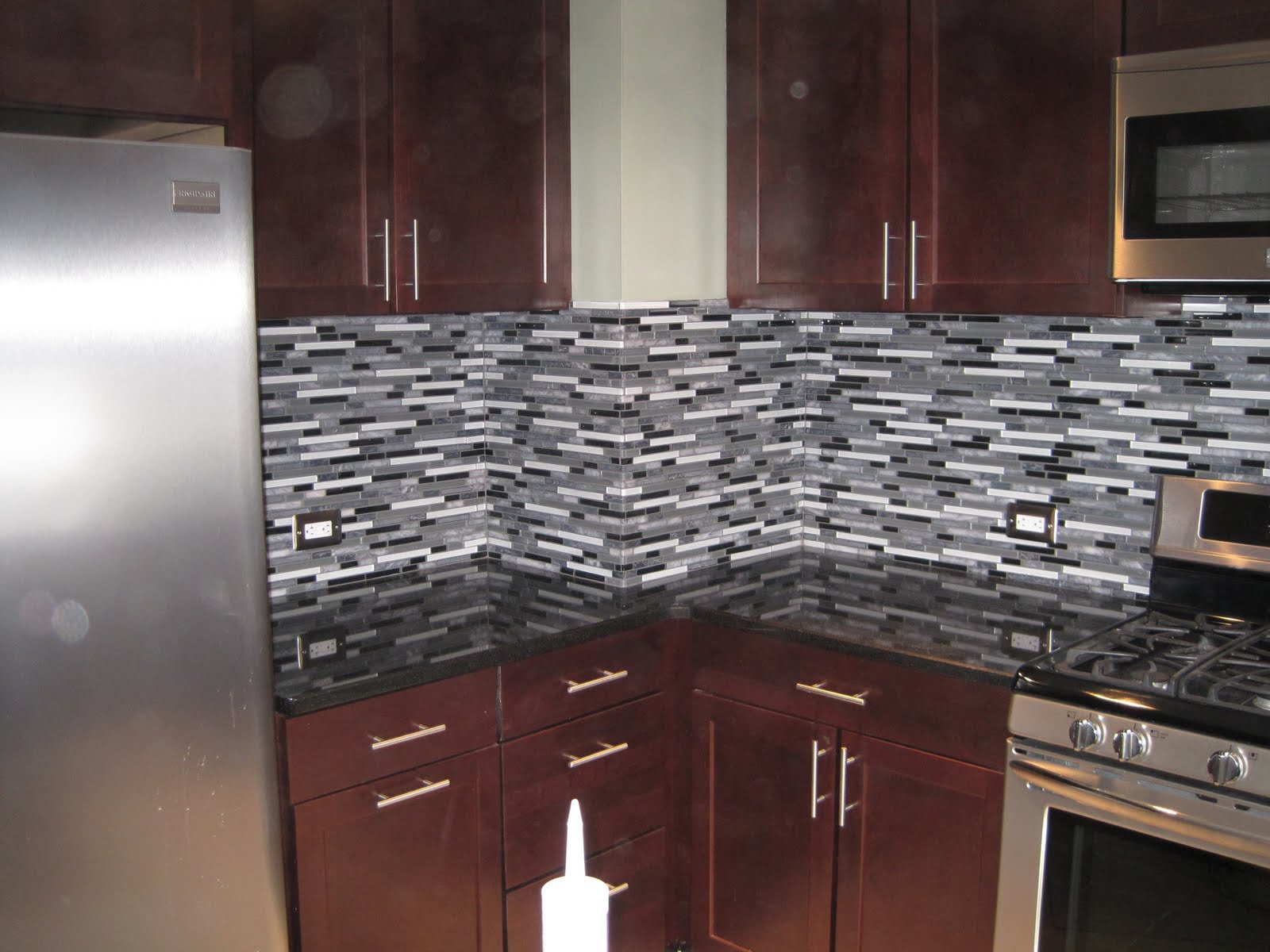 DS Tile and Stone Installations Amazing glass backsplash