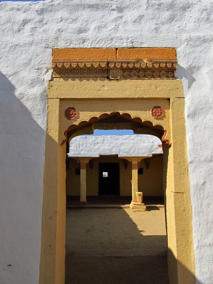 Kuldhara — Abandoned Village Near Jaisalmer Kuldhara village near Jaisalmer has a very unique history! It is said that the residents of 84 neighboring villages including Kuldhara vacated the villages overnight around 170 years back!! No one is sure where they have gone, but they are believed to have migrated to a place somewhere near Jodhpur. The residents were Paliwal Brahmans — said to be very intelligent, and residing there for about 500 years. So what made them do such an act? Stories say that the ruler of these villages pounded the Paliwals with heavy taxes and treated them very inhumanly; the ruler was unethical and forceful to them. They had no alternative, but to vacate all the 84 villages overnight and just disappear from the vision and reach of the ruler. When the Paliwals left the villages, they left a curse that nobody can inhabit the villages ever. Residents of Jaisalmer say that there have been some attempts by some families to stay there, but they did not succeed.