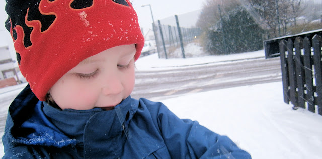young boy in snow scene