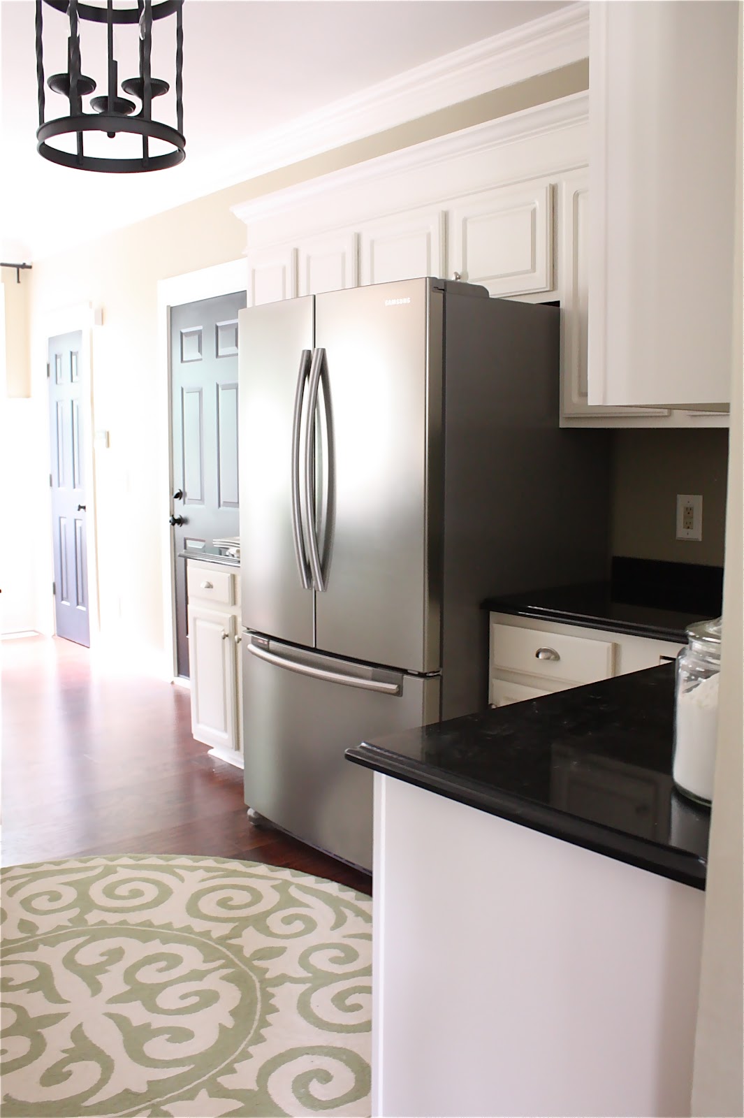 The Yellow Cape Cod Making Cabinets Taller Builder Cabinets Go