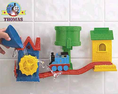 Preschool Thomas the train and friend bath tracks set racing down wet water-slide track rail rapids