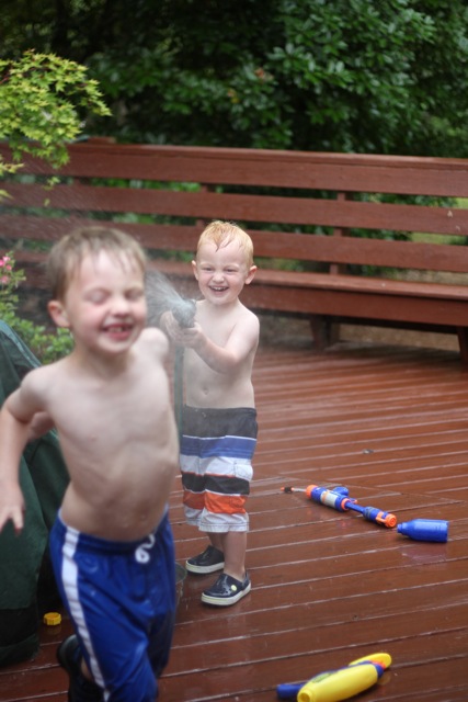 boys with garden hose
