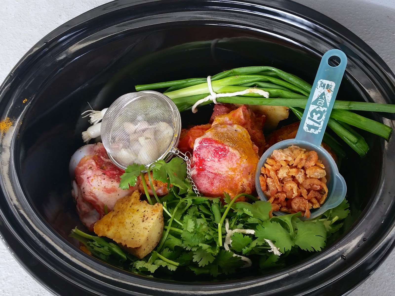 Red Kitchen Recipes Bone Broth with Asian Herbs in the Slow Cooker