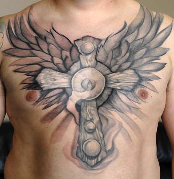 Cross tattoos with wings for men Posted on October 25 2011 by Poker Guru