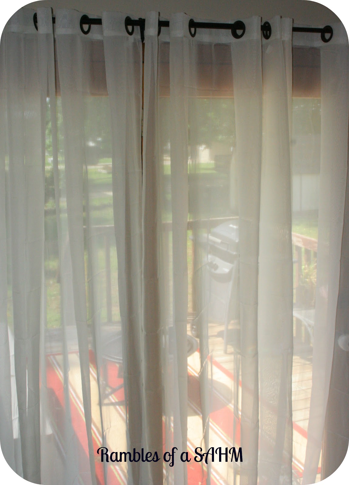 See Through Shower Curtain Curtains shown in ivory.