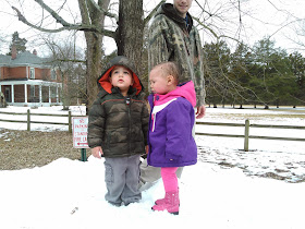 Brooklyn, who has ichthyosis, and her brother in the snow