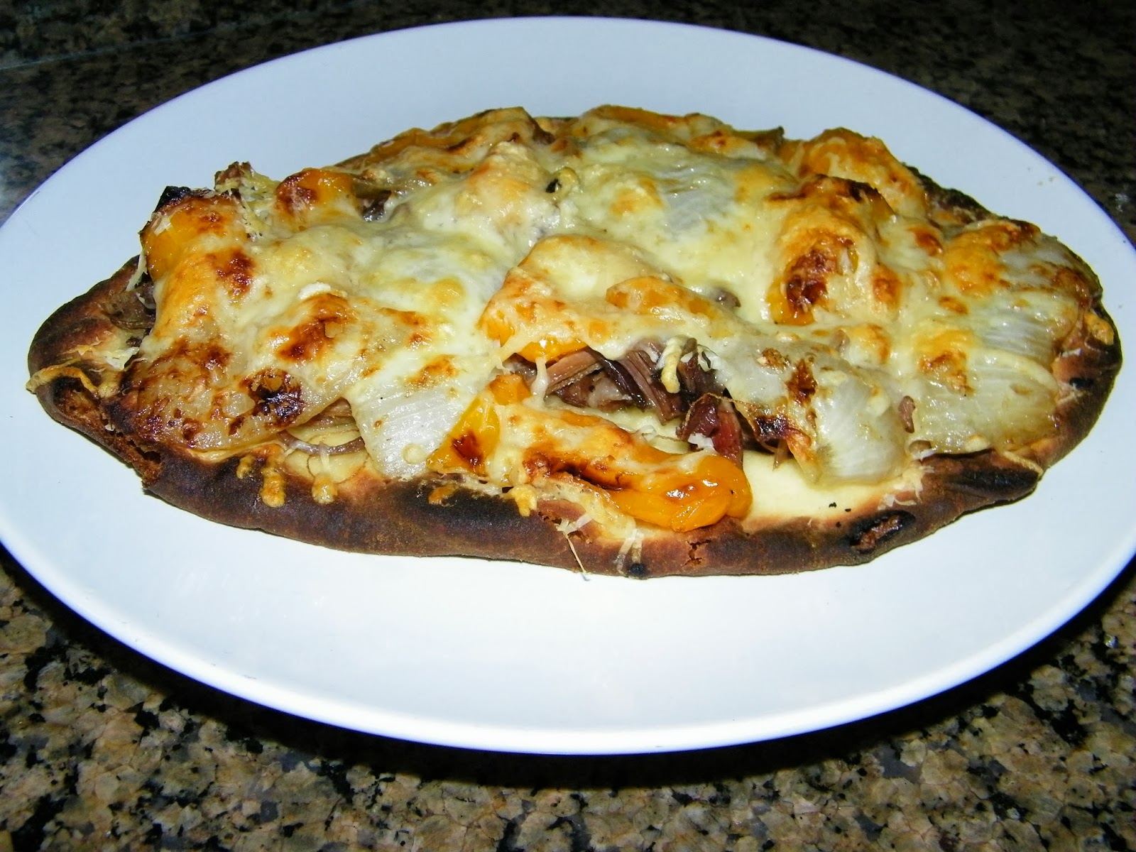 Sauceless Steak Onion and Pepper Naan Bread Pizza THE APRON