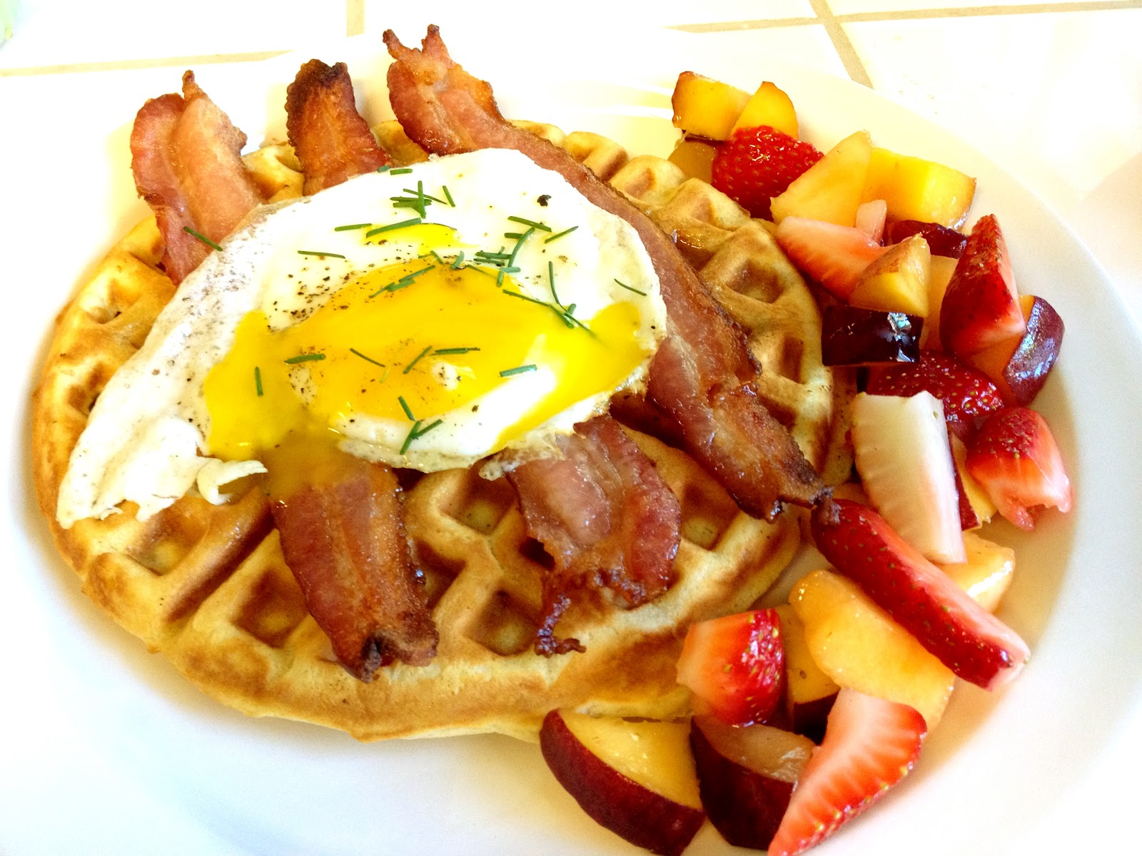 Evolution of a Foodie Sour Cream Waffles topped with Bacon and an Egg