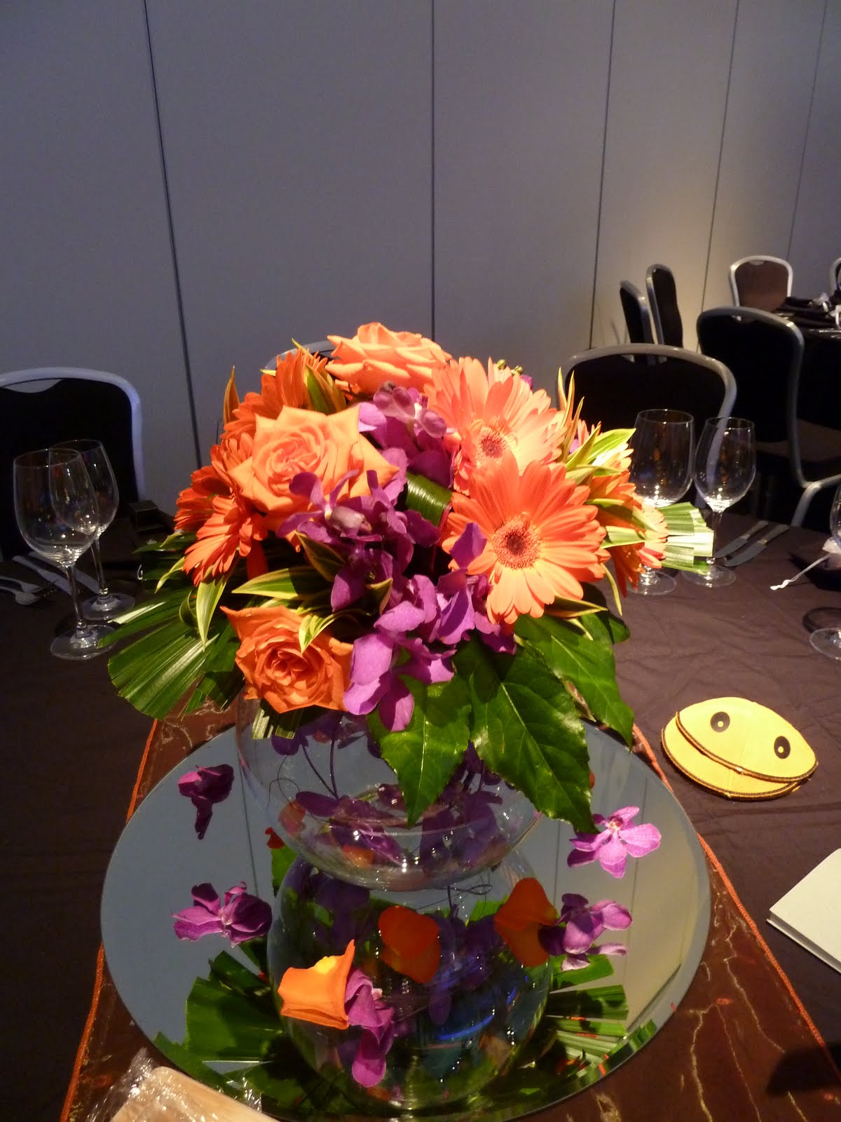 The Flower Lounge Purple and orange bar mitzvah flowers at LCCC