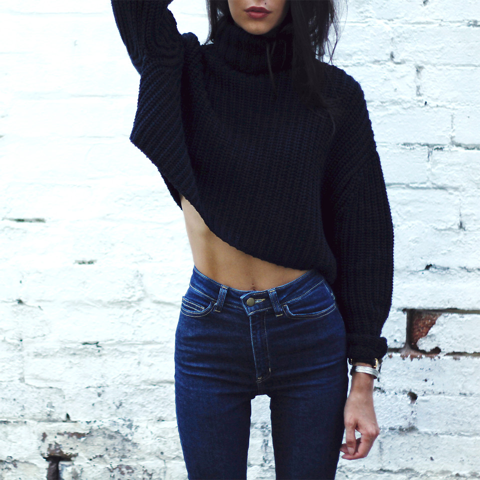 High Waisted Jeans Outfit With Cowboy Boots And Black Turtleneck