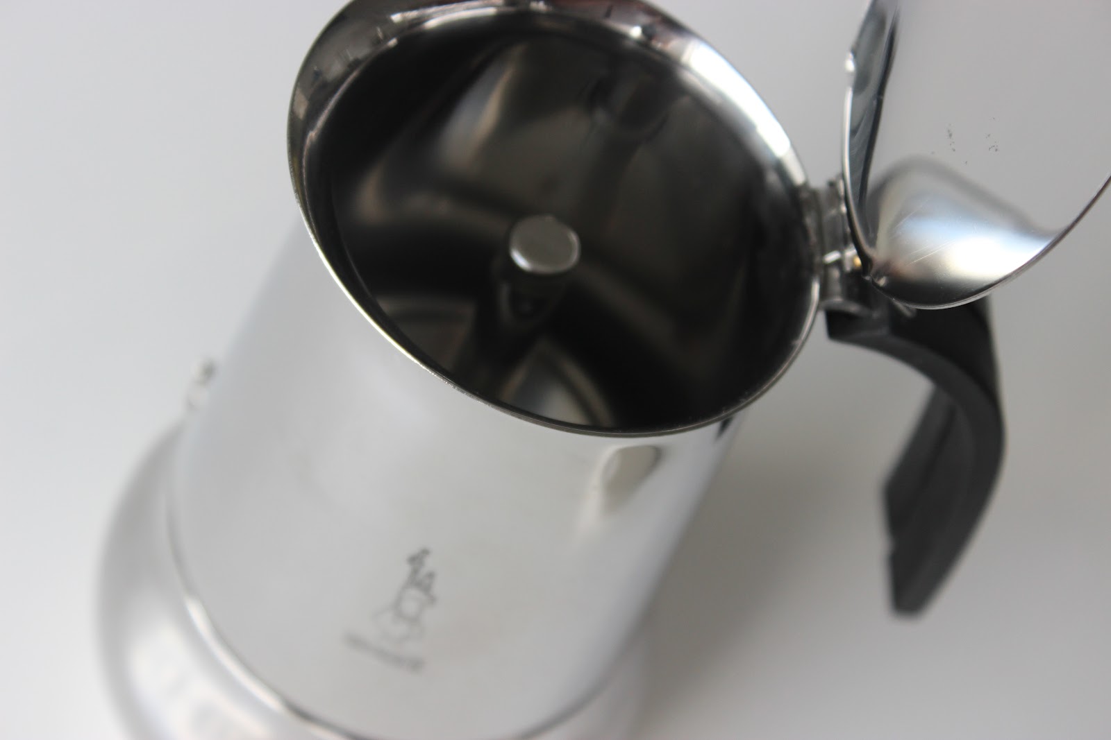 A really big bialetti (9 cups?) made in Italy, basically unused