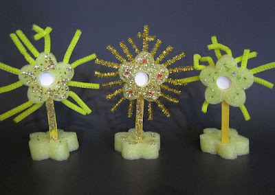 Side-by-side comparison of foam and pipe cleaner monstrance crafts