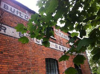 Ghost sign on old merchant's building in Nailsworth, Gloucestershire